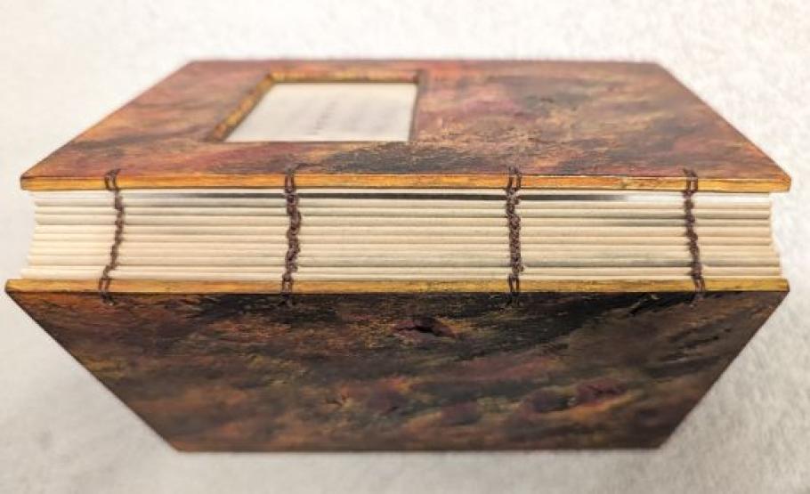 The spine of a hand-bound book.