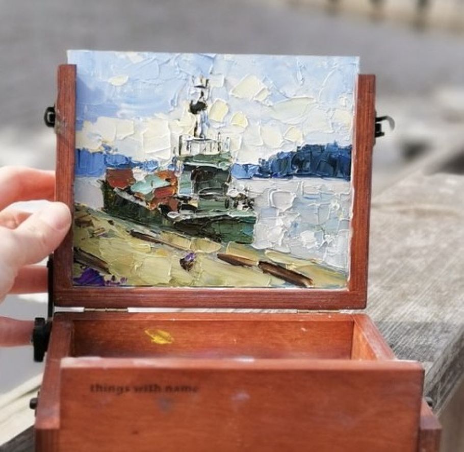 A mini oil painting of a boat