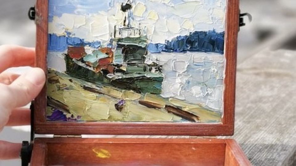 A mini oil painting of a boat