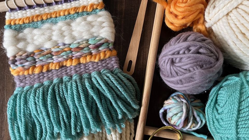 Balls of yarn and weaved fabric